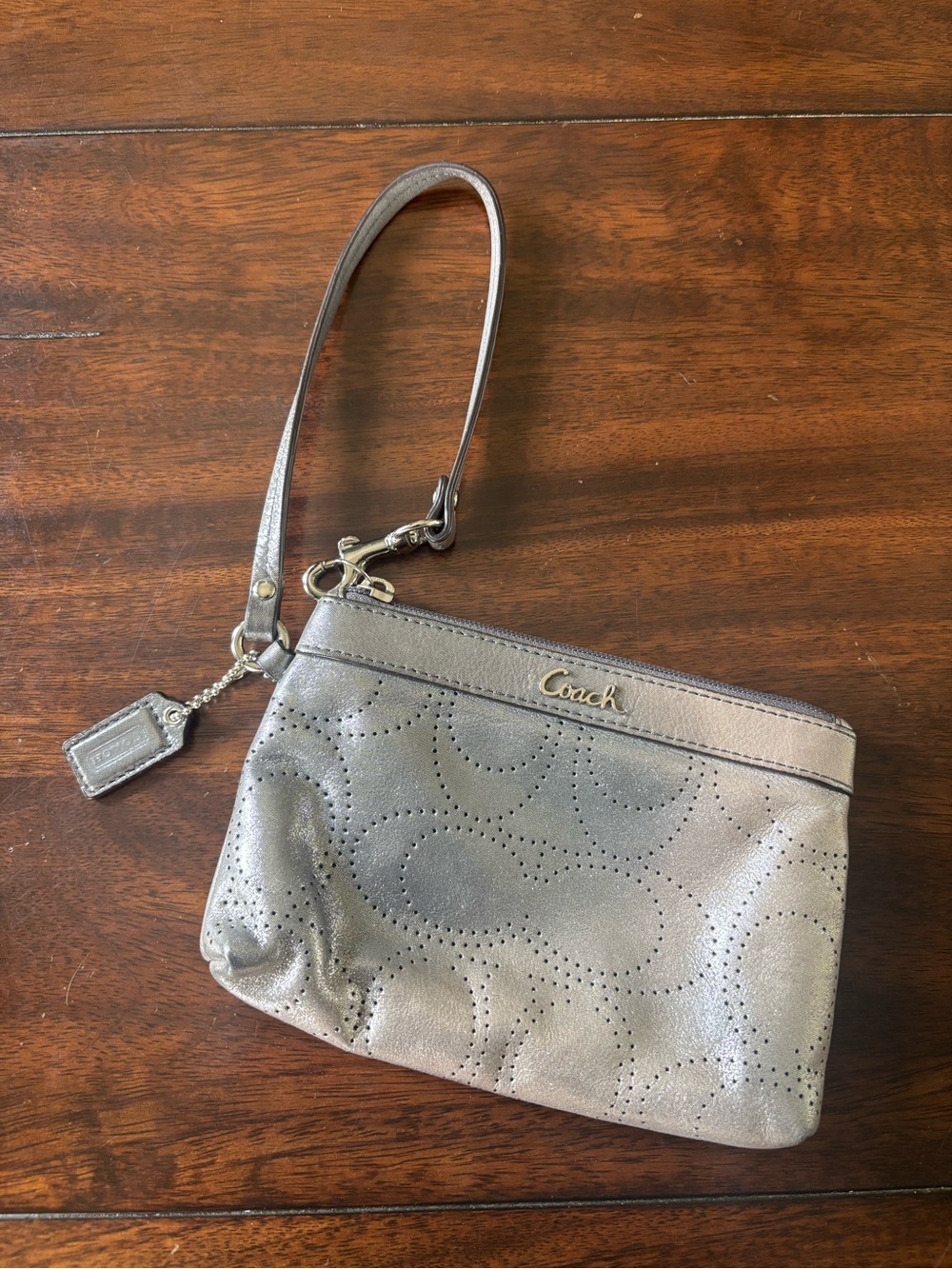 Coach Metallic Silver Perforated Wristlet